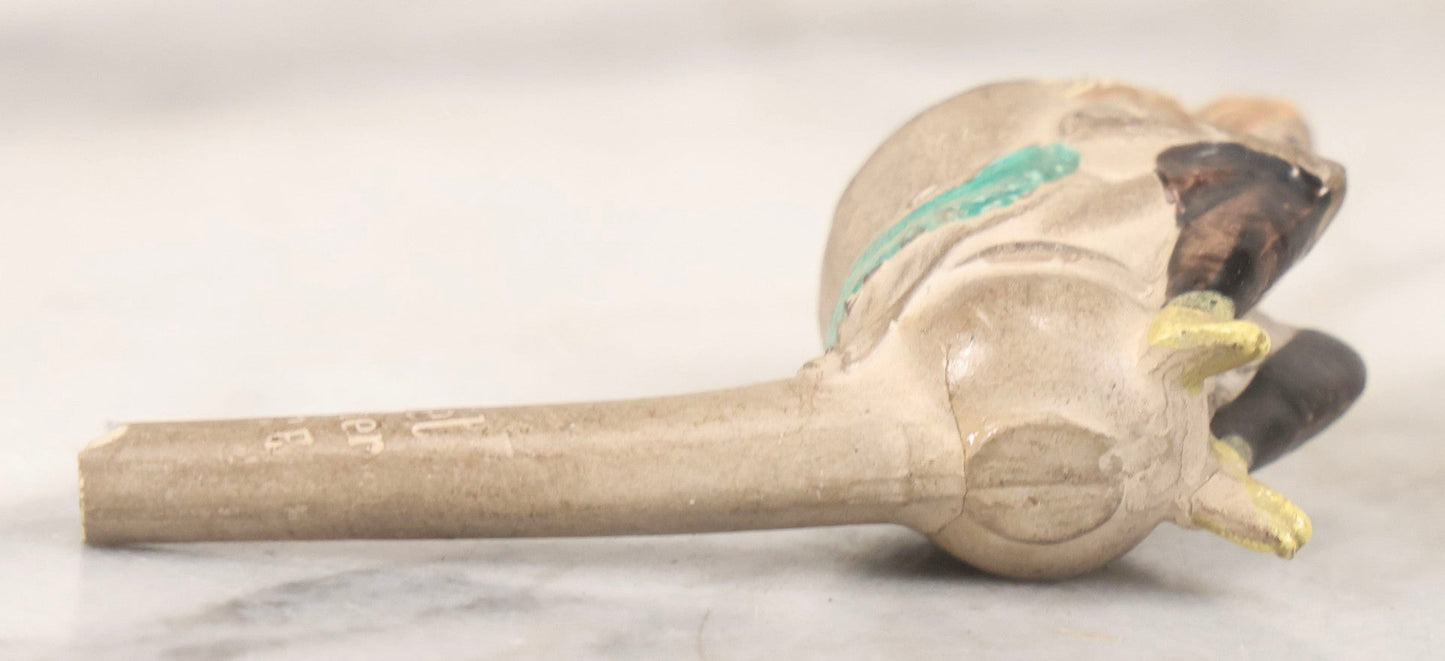 Lot 132 - Antique Painted Clay Figural Pipe Of A Busty Blonde Woman Sitting On A Chamber Pot, Stamped L. Fiolet, St. Omer, France, Note Stem Broken, 3-1/8" L