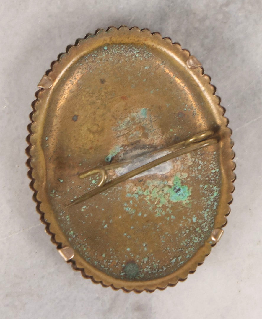 Lot 133 - Antique Celluloid Portrait Brooch With Hand-Tinted Photograph Of Young Woman With Rosy Cheeks In Brass Bezel