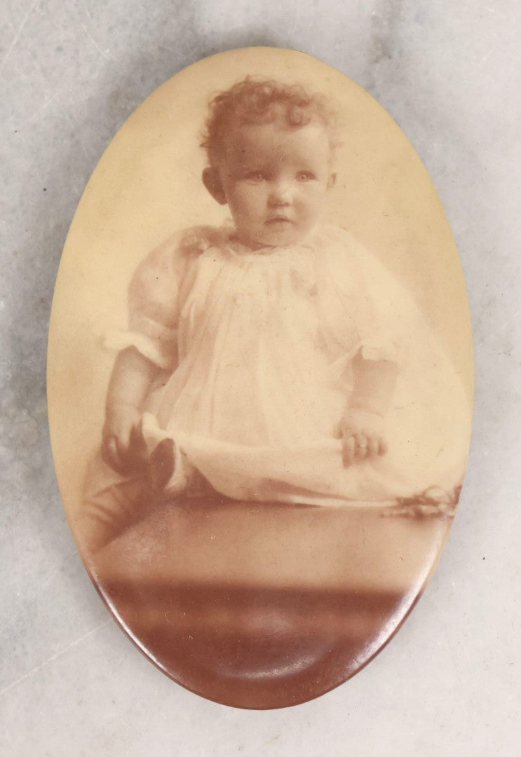 Lot 134 - Antique Celluloid Photo Button Pocket Mirror With Portrait Of Curly-Haired Baby In White Gown