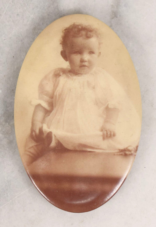 Lot 134 - Antique Celluloid Photo Button Pocket Mirror With Portrait Of Curly-Haired Baby In White Gown