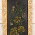 Lot 144 - Antique Oil On Board Painting Of Yellow And White Flowers On Black Background On Tin, In Gilt Wood Frame With Leaf Design, 9-3/8" x 22-1/4"