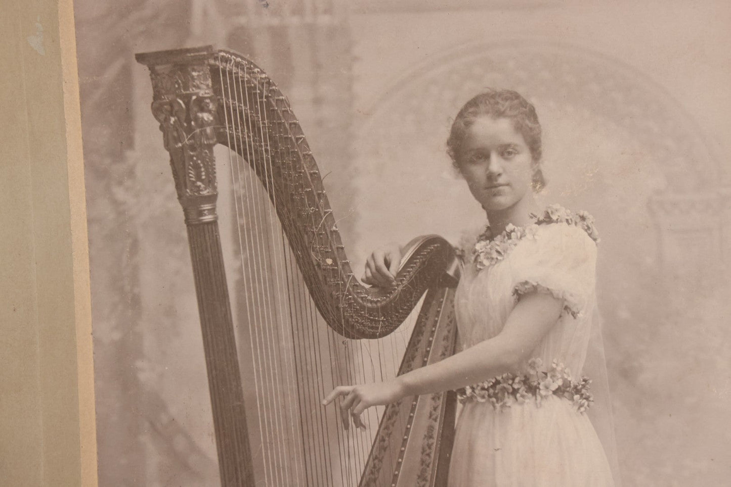 Lot 154 - Antique Boarded Photograph Of Young Girl In White Dress Playing Ornate Harp, Photographed By Belsmith, Cincinnati, Ohio