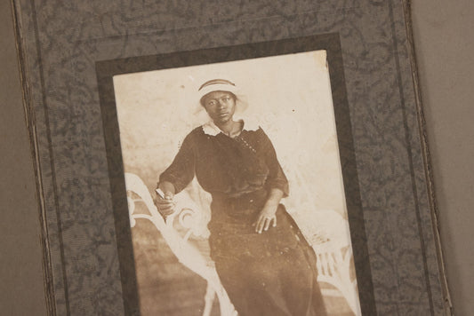 Lot 156 - Antique Foldered Photograph Of African American Woman In Hat Posing On Wicker Chair, Addressed To Freddie Dean