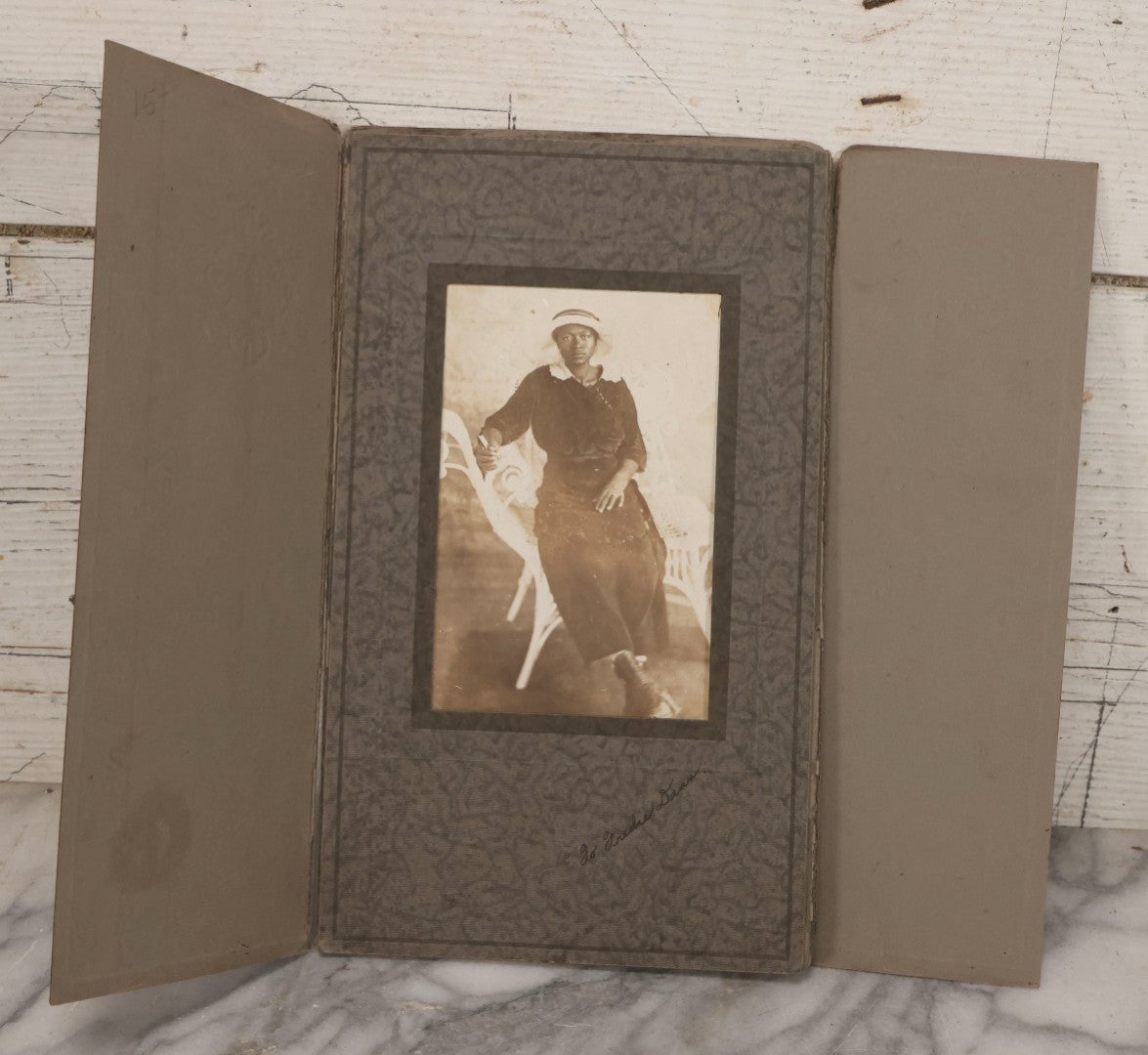 Lot 156 - Antique Foldered Photograph Of African American Woman In Hat Posing On Wicker Chair, Addressed To Freddie Dean