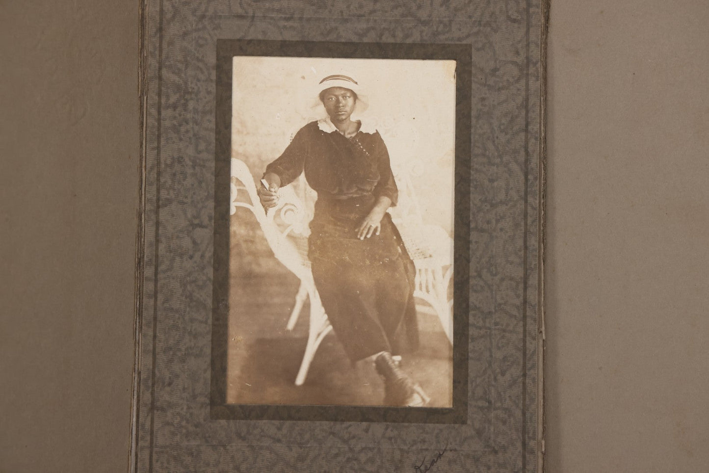 Lot 156 - Antique Foldered Photograph Of African American Woman In Hat Posing On Wicker Chair, Addressed To Freddie Dean