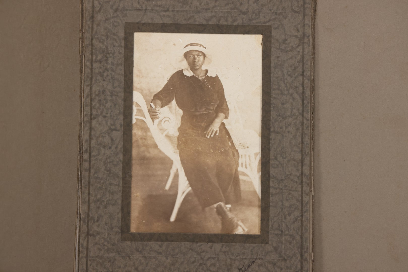Lot 156 - Antique Foldered Photograph Of African American Woman In Hat Posing On Wicker Chair, Addressed To Freddie Dean