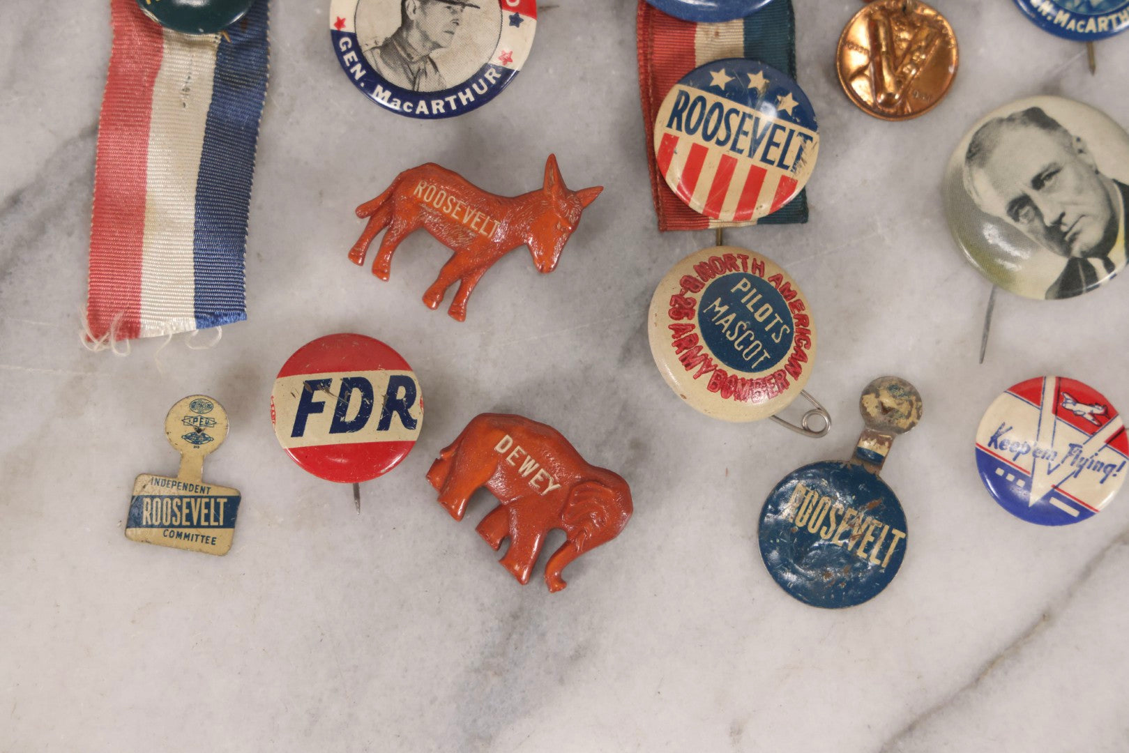 Lot 186 - Grouping Of 20 Vintage Franklin D. Roosevelt Era Political Buttons And Badges Including “Remember Pearl Harbor,” “To Hell With Hitler,” And Democratic Donkey Pin