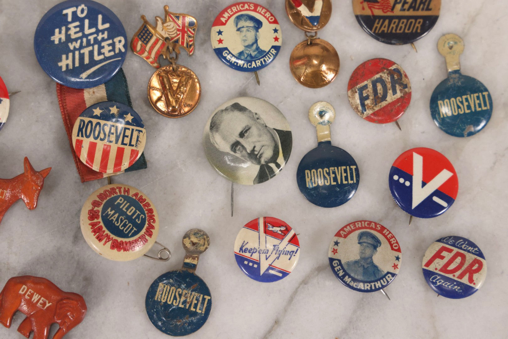 Lot 186 - Grouping Of 20 Vintage Franklin D. Roosevelt Era Political Buttons And Badges Including “Remember Pearl Harbor,” “To Hell With Hitler,” And Democratic Donkey Pin