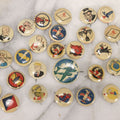 Lot 187 - Grouping Of 30 Vintage Kellogg's Pep Cereal Pinback Buttons Featuring Comic Strip Characters Like Popeye And Lord Pushbottom And World War II Military Insignia, Copyright 1946