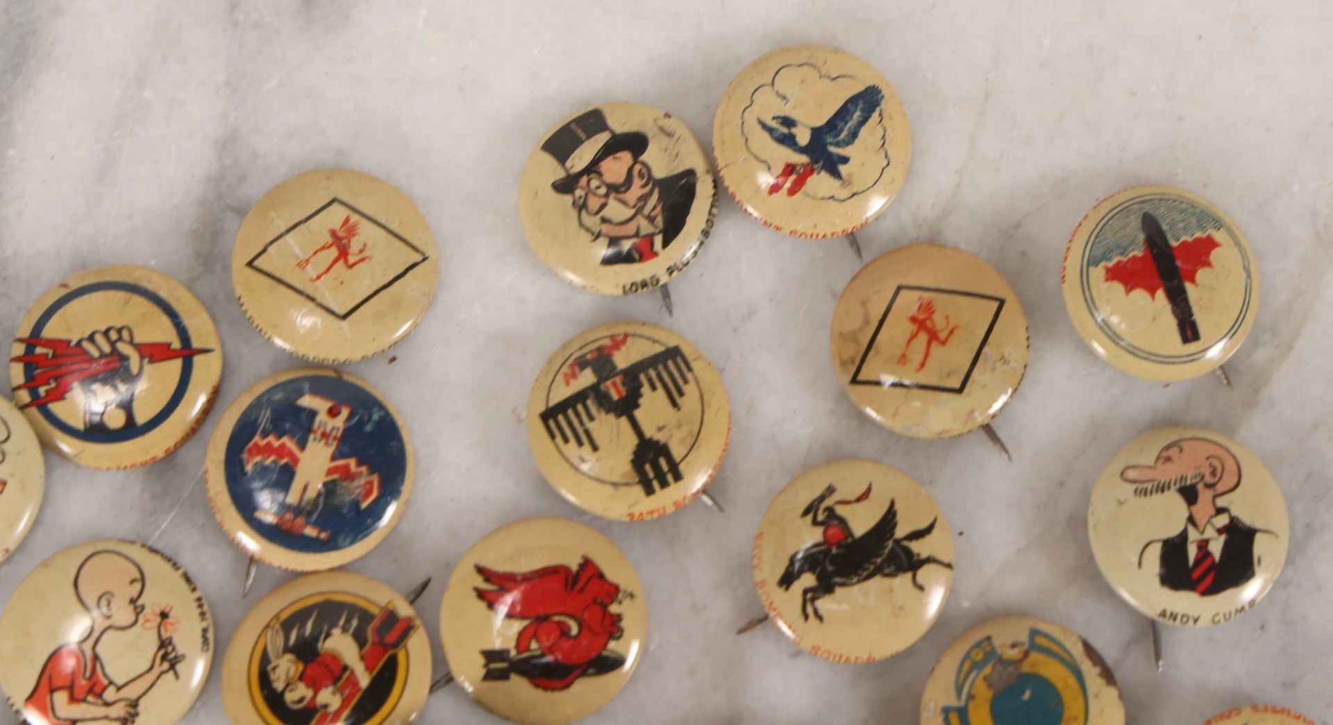Lot 187 - Grouping Of 30 Vintage Kellogg's Pep Cereal Pinback Buttons Featuring Comic Strip Characters Like Popeye And Lord Pushbottom And World War II Military Insignia, Copyright 1946