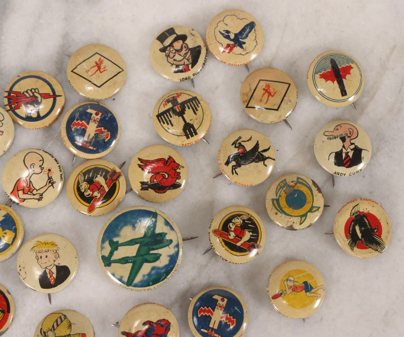 Lot 187 - Grouping Of 30 Vintage Kellogg's Pep Cereal Pinback Buttons Featuring Comic Strip Characters Like Popeye And Lord Pushbottom And World War II Military Insignia, Copyright 1946