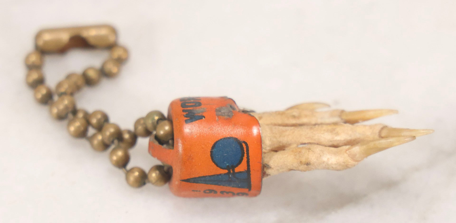 Lot 188 - Vintage 1939 New York World's Fair Lucky Rabbit's Foot Keychain With Tin Lithograph Mount Depicting Trylon And Perisphere