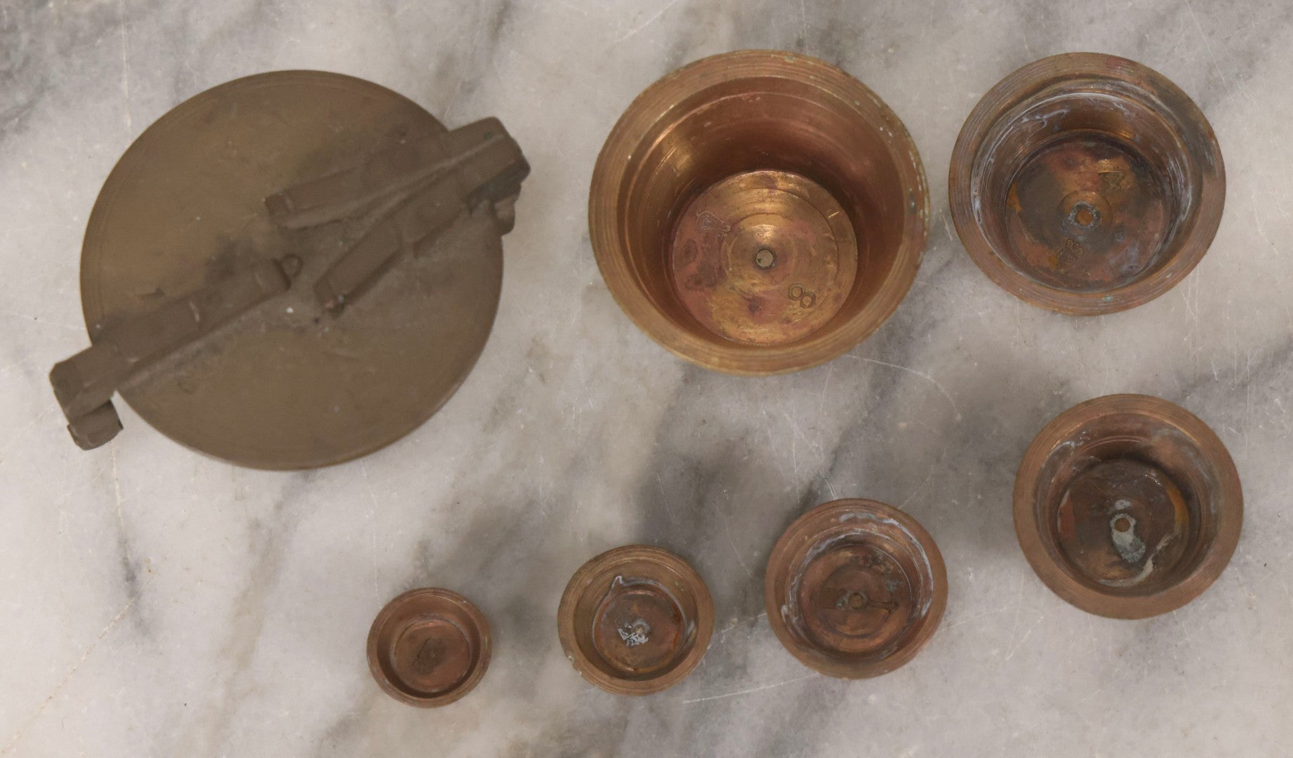 Lot 192 - Antique Bronze Nested Apothecary Or Military Measuring Cup Weight Set, Seven Pieces