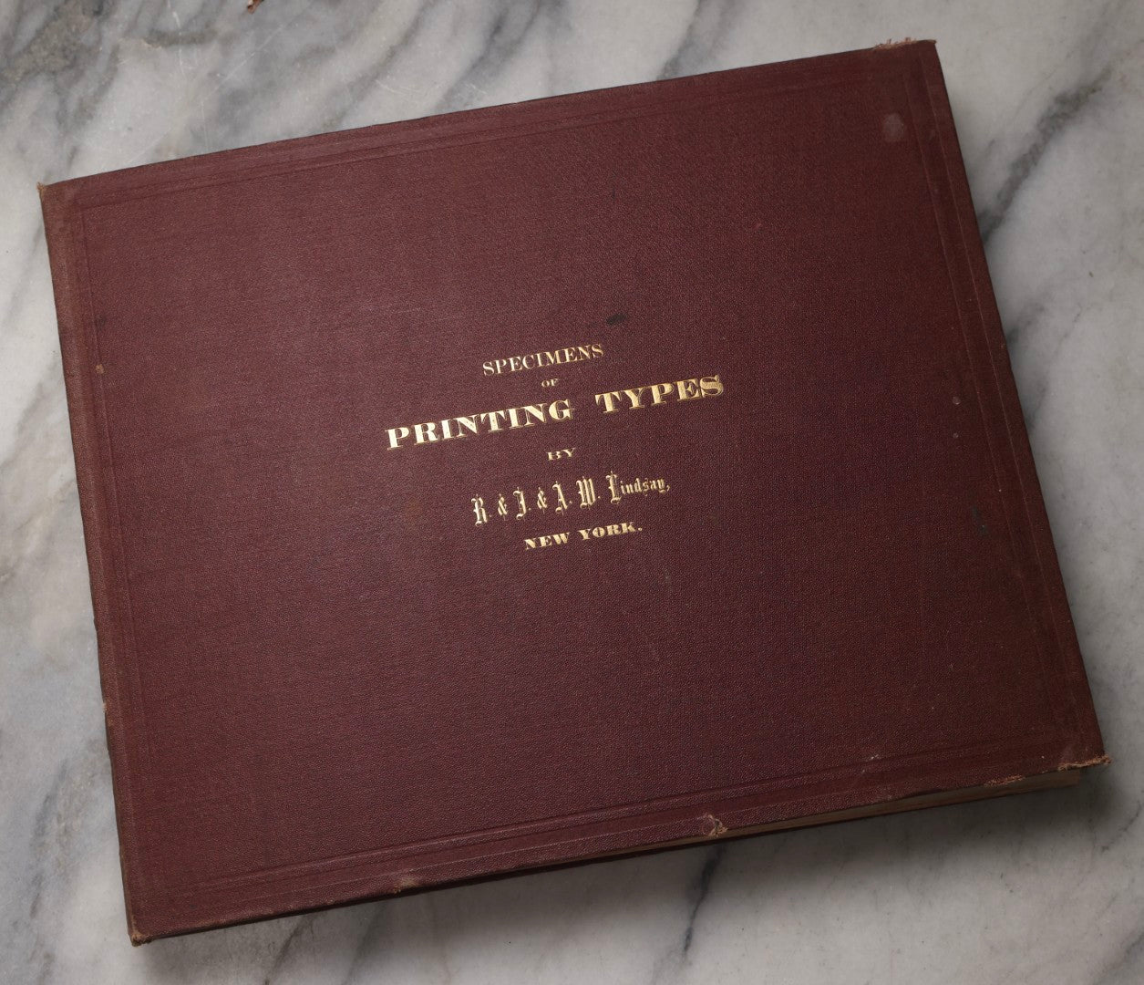 Lot 217 - "Specimens Of Printing Types" Antique Book By R. & J. & A. W. Lindsay, New York, Repurposed As Scrapbook With 70+ Pasted Receipts, 1870–1881