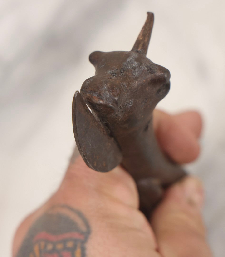 Lot 082 - Antique Cast Iron “Bully Beef” Can Opener With Cow's Head Form And Spike, 6-3/4" L