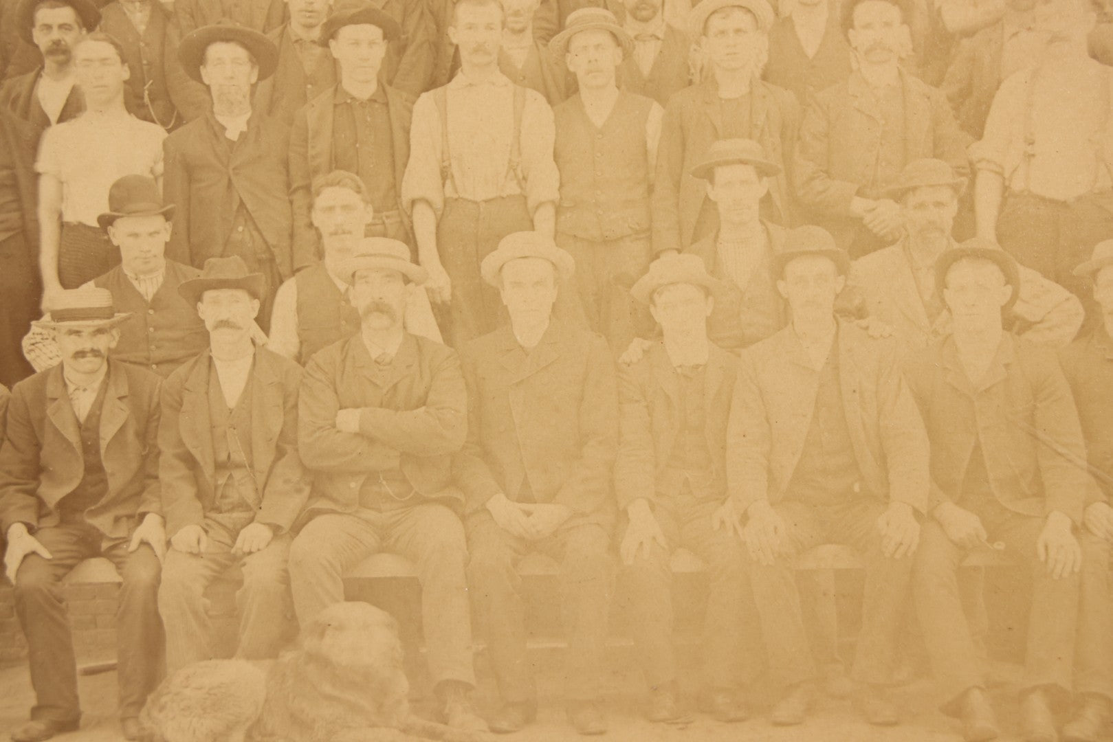 Lot 137 - Antique Occupational Boarded Photograph Of Factory Workers With Dog In Deep Walnut Frame, Circa 1880–1890, 13-1/2" x 11-1/2"