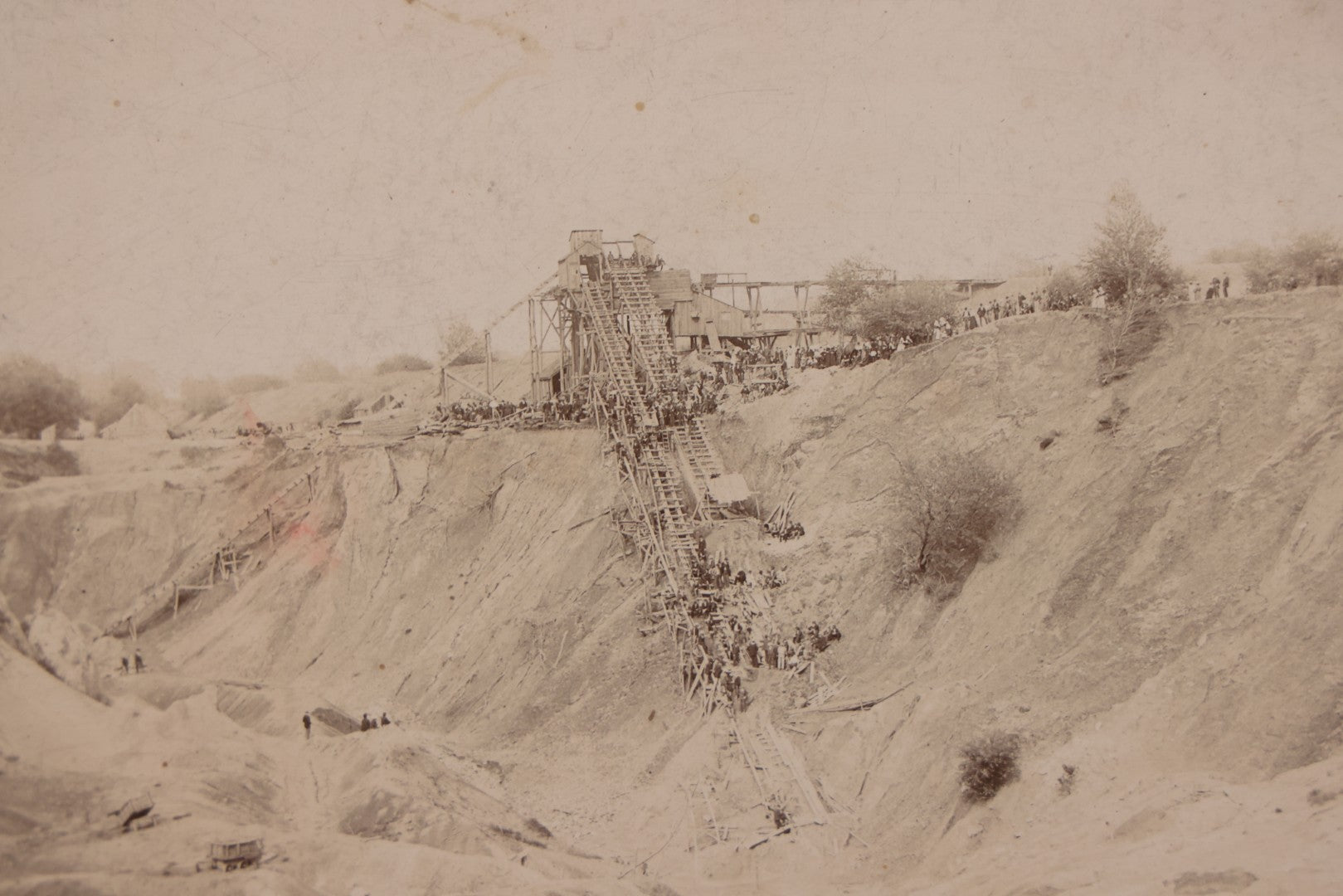 Lot 144 - Antique Boarded Occupational Photograph Of Large-Scale Quarry Or Excavation Site With Workers And Hoisting Structure