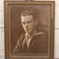 Lot 150 - Vintage Portrait Photograph Of World War Two Era Navy Sailor In Patriotic Frame With Eagle And Shield Crest, Photographed By Oliver