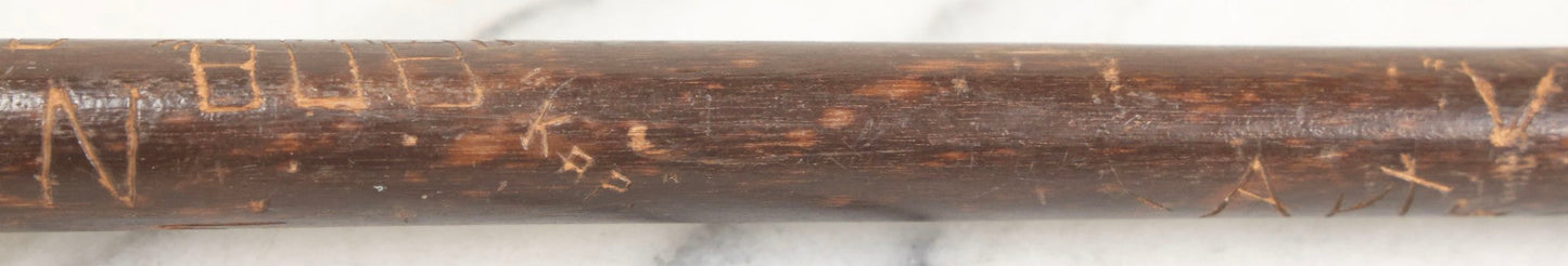 Lot 003 - Vintage Hand-Carved White Mountains, New Hampshire Folk Art Hiking Stick With Double-Sided Old Man Of The Mountain Carved Handle And Decades Of Carved Initials, Names, And Nicknames, 36" L
