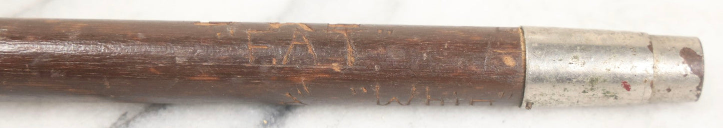 Lot 003 - Vintage Hand-Carved White Mountains, New Hampshire Folk Art Hiking Stick With Double-Sided Old Man Of The Mountain Carved Handle And Decades Of Carved Initials, Names, And Nicknames, 36" L