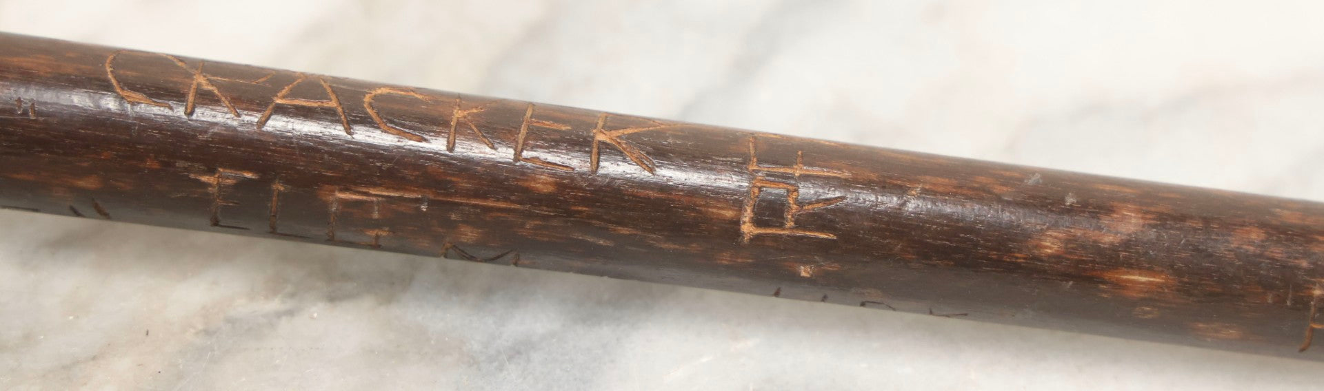 Lot 003 - Vintage Hand-Carved White Mountains, New Hampshire Folk Art Hiking Stick With Double-Sided Old Man Of The Mountain Carved Handle And Decades Of Carved Initials, Names, And Nicknames, 36" L