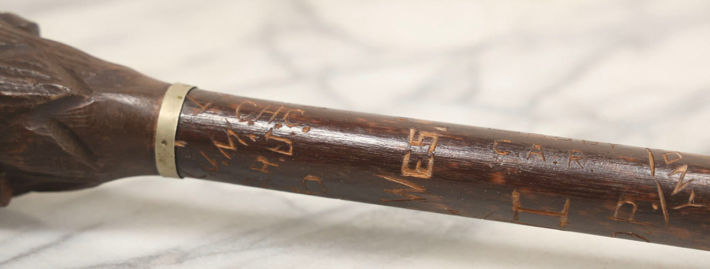 Lot 003 - Vintage Hand-Carved White Mountains, New Hampshire Folk Art Hiking Stick With Double-Sided Old Man Of The Mountain Carved Handle And Decades Of Carved Initials, Names, And Nicknames, 36" L