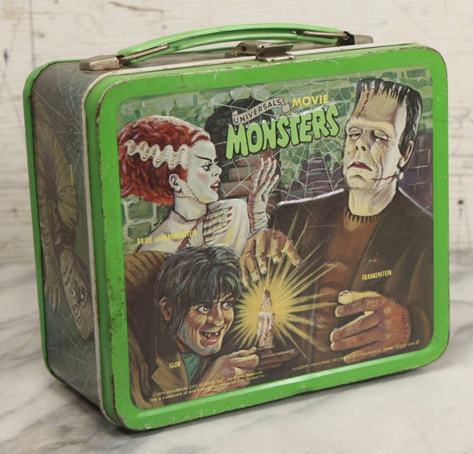 Lot 008 - Vintage Universal Movie Monsters Aladdin Brand Tin Lithograph Lunchbox Featuring Count Dracula, Wolf Man, Frankenstein, Mummy, Phantom Of The Opera, Creature From The Black Lagoon, Copyright 1979, Aladdin Industries Inc., Nashville, Tennessee
