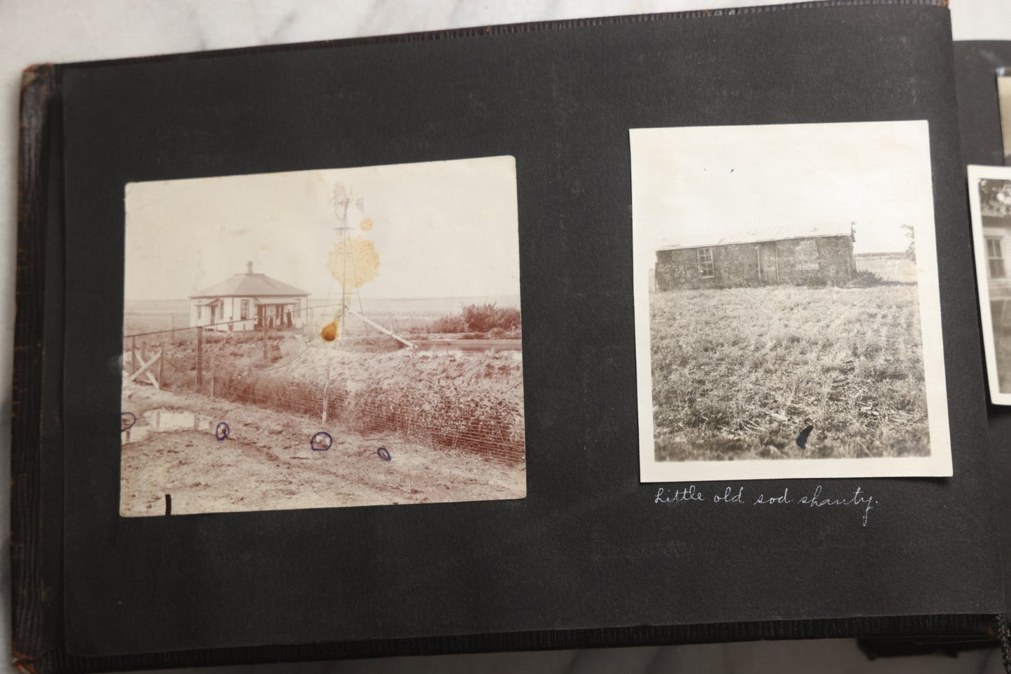 Lot 025 - Antique Snapshot Photo Album Gifted To Zella On Christmas 1916 With 1750+ Photos Of Midwest And Western Scenes Including Telluride & Greeley Colorado, Farm Life, Animals, Automobiles, Oil Wells, Early Aviation, And WWI Soldiers, 1916–1920
