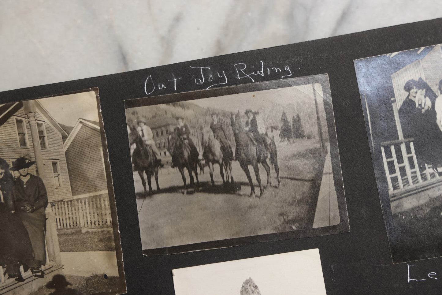 Lot 025 - Antique Snapshot Photo Album Gifted To Zella On Christmas 1916 With 1750+ Photos Of Midwest And Western Scenes Including Telluride & Greeley Colorado, Farm Life, Animals, Automobiles, Oil Wells, Early Aviation, And WWI Soldiers, 1916–1920