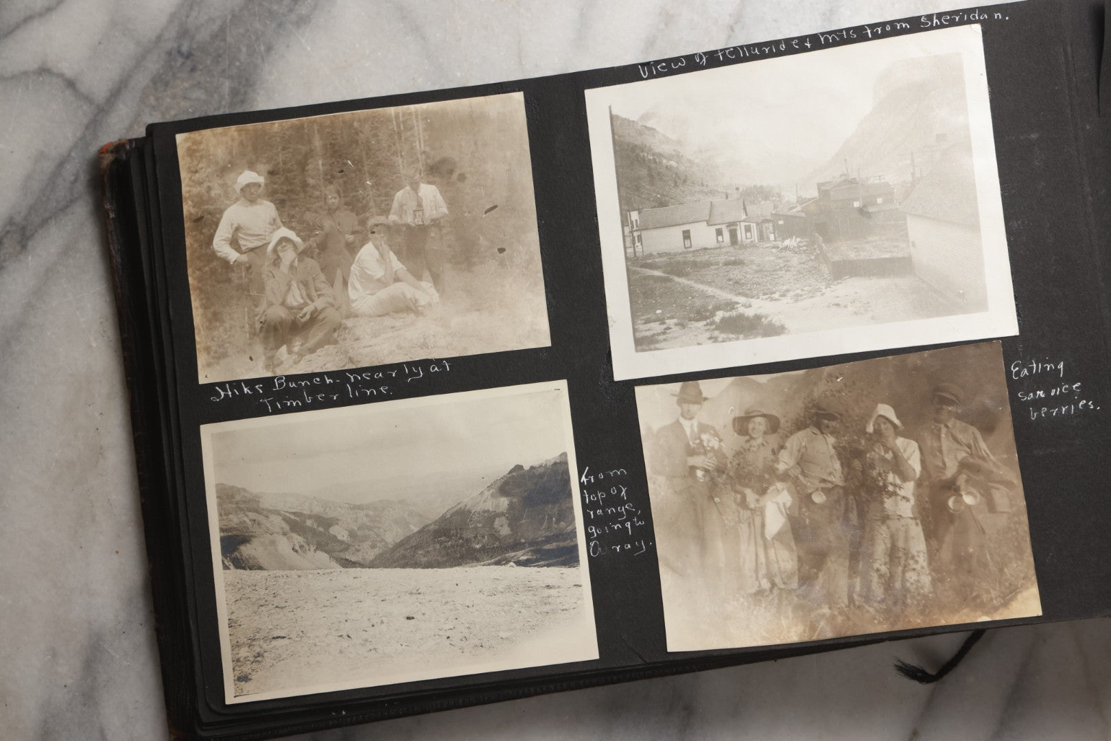 Lot 025 - Antique Snapshot Photo Album Gifted To Zella On Christmas 1916 With 1750+ Photos Of Midwest And Western Scenes Including Telluride & Greeley Colorado, Farm Life, Animals, Automobiles, Oil Wells, Early Aviation, And WWI Soldiers, 1916–1920