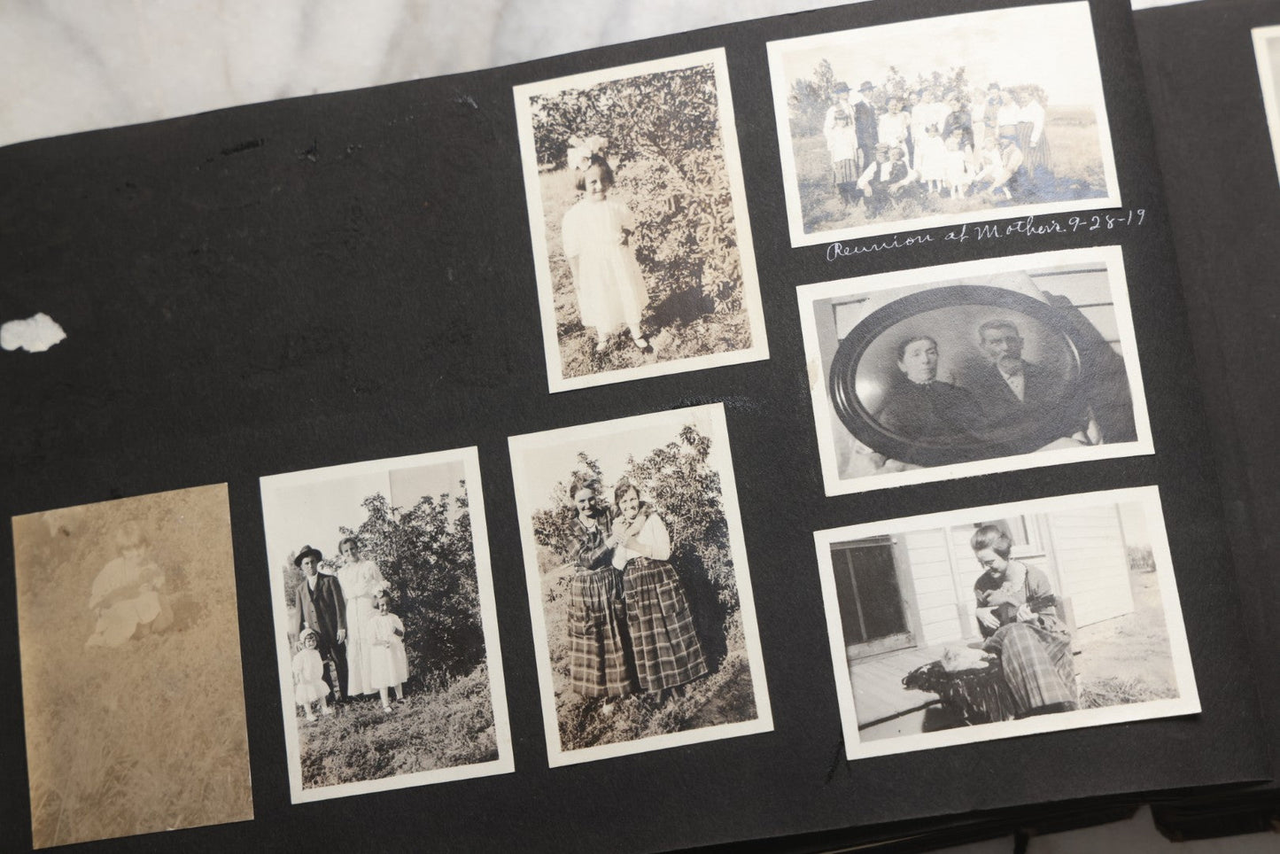 Lot 025 - Antique Snapshot Photo Album Gifted To Zella On Christmas 1916 With 1750+ Photos Of Midwest And Western Scenes Including Telluride & Greeley Colorado, Farm Life, Animals, Automobiles, Oil Wells, Early Aviation, And WWI Soldiers, 1916–1920