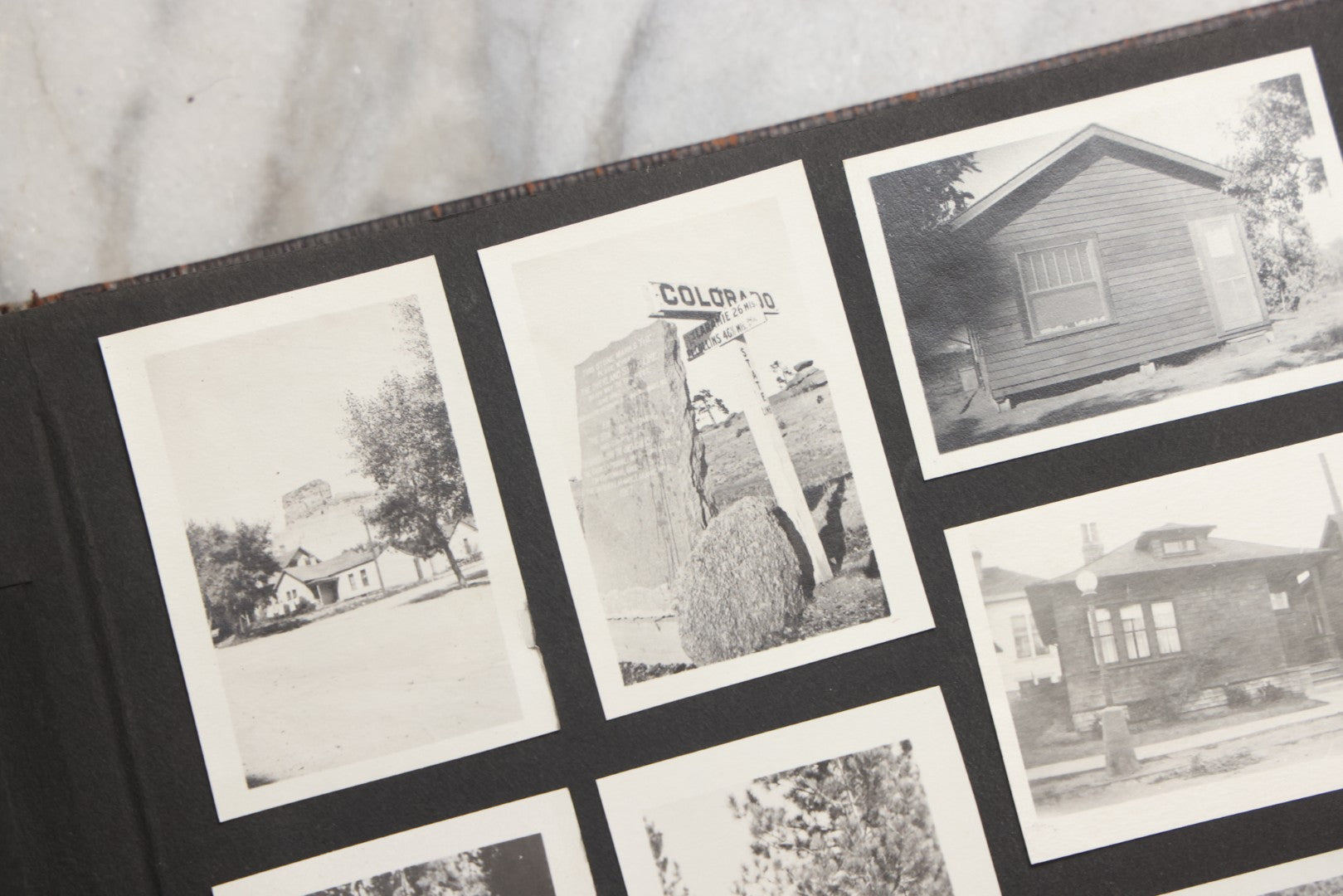 Lot 025 - Antique Snapshot Photo Album Gifted To Zella On Christmas 1916 With 1750+ Photos Of Midwest And Western Scenes Including Telluride & Greeley Colorado, Farm Life, Animals, Automobiles, Oil Wells, Early Aviation, And WWI Soldiers, 1916–1920