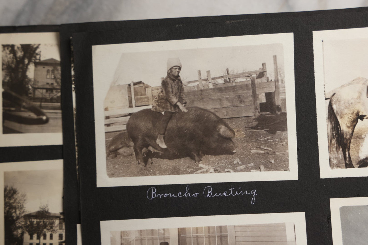 Lot 025 - Antique Snapshot Photo Album Gifted To Zella On Christmas 1916 With 1750+ Photos Of Midwest And Western Scenes Including Telluride & Greeley Colorado, Farm Life, Animals, Automobiles, Oil Wells, Early Aviation, And WWI Soldiers, 1916–1920