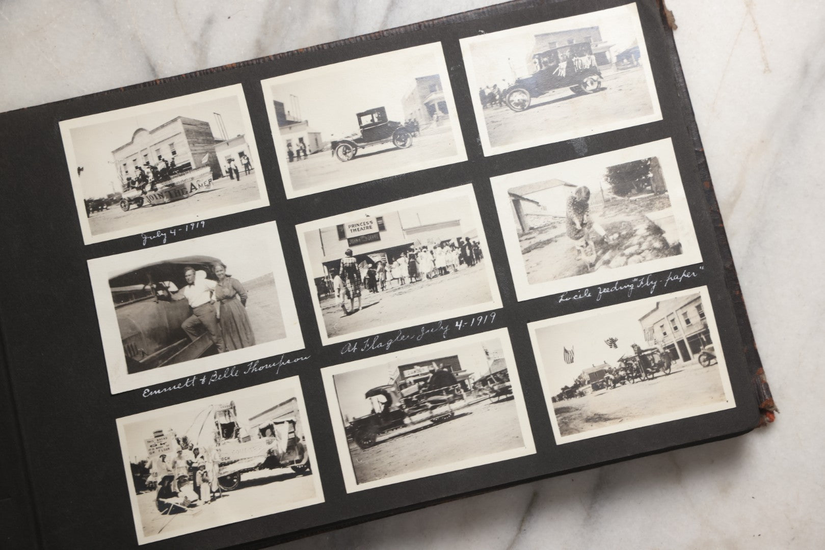 Lot 025 - Antique Snapshot Photo Album Gifted To Zella On Christmas 1916 With 1750+ Photos Of Midwest And Western Scenes Including Telluride & Greeley Colorado, Farm Life, Animals, Automobiles, Oil Wells, Early Aviation, And WWI Soldiers, 1916–1920