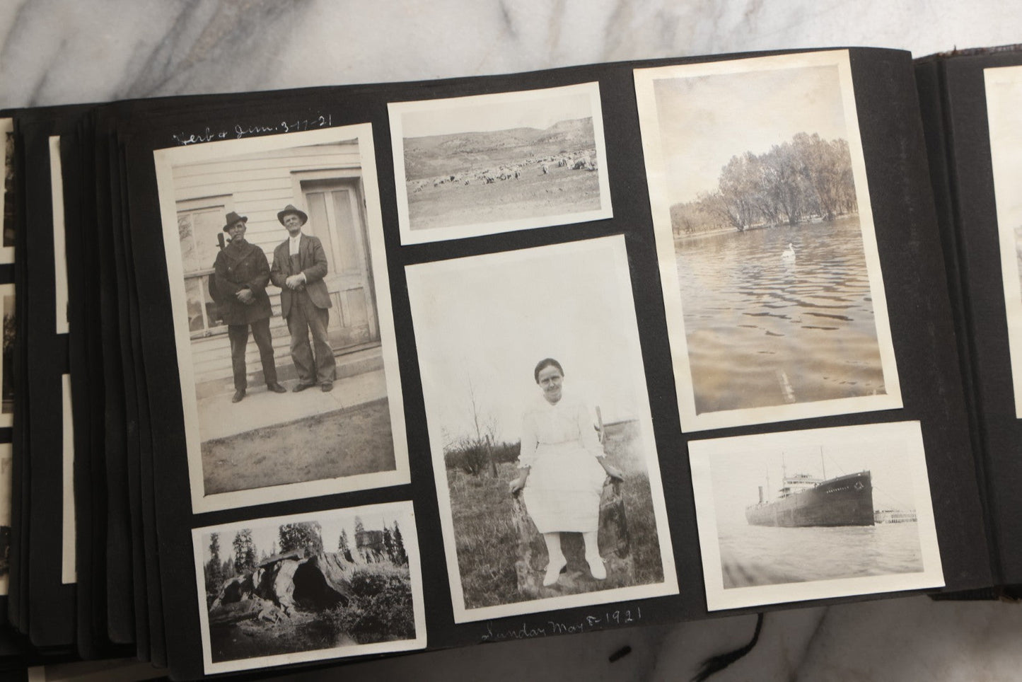 Lot 025 - Antique Snapshot Photo Album Gifted To Zella On Christmas 1916 With 1750+ Photos Of Midwest And Western Scenes Including Telluride & Greeley Colorado, Farm Life, Animals, Automobiles, Oil Wells, Early Aviation, And WWI Soldiers, 1916–1920