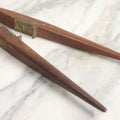 Lot 031 - Antique Wood-Handled Nutcracker With Brass Hardware, Bent Brass Spring Band, And Aggressive Brass Jaws, 9-3/4" L