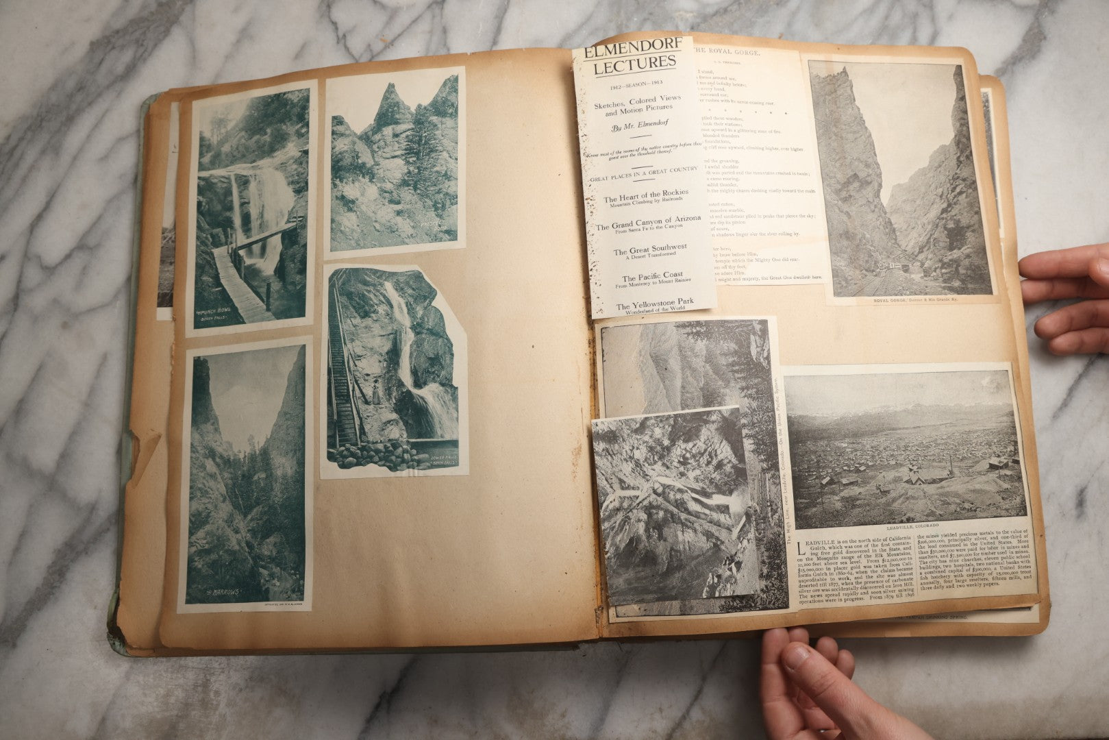Lot 080 - Antique Light Blue Scrapbook Album With Silver Painted Embossed Decorations, California, San Francisco Chinatown, Oakland, Yosemite Ephemera, Homemade Herbarium With Location Captions Including Yellowstone Park And Utah, Circa 1897