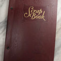 Lot 088 - Vintage Paperboard Scrapbook Album With Embossed Windmill Design, Politicians, Royalty, Popular Science, Events, And Lindbergh Family Newspaper Clippings, Circa 1930s