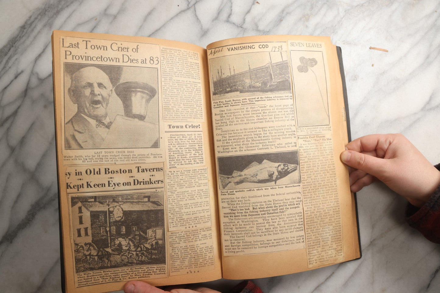 Lot 088 - Vintage Paperboard Scrapbook Album With Embossed Windmill Design, Politicians, Royalty, Popular Science, Events, And Lindbergh Family Newspaper Clippings, Circa 1930s