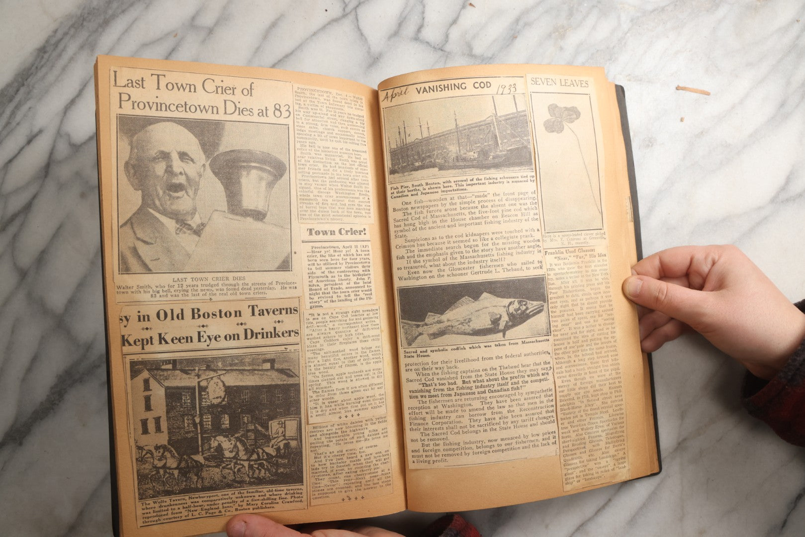 Lot 088 - Vintage Paperboard Scrapbook Album With Embossed Windmill Design, Politicians, Royalty, Popular Science, Events, And Lindbergh Family Newspaper Clippings, Circa 1930s