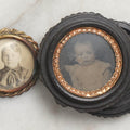 Lot 103 - Pair Of Antique Photographs Including Tintype Of Baby In Thermoplastic Screw-Top “Oreo” Case And Trimmed Carte De Visite C.D.V.. Of Boy In Brass Brooch Frame, Brooch Missing Pin On Back