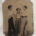 Lot 117 - Antique Tintype Photograph Of Three Young Men Staging Fisticuffs Scene, Two Squaring Off With Clenched Fists And Third Acting As Referee, All Wearing Hats