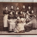 Lot 133 - Antique Cabinet Card Photograph Of Twelve Women Posed With Sewing Tools And Apparatus, Including Thread, Bobbins, And Scissors, Photographed By O. Desmarais, 999 Elm Street, Manchester, New Hampshire