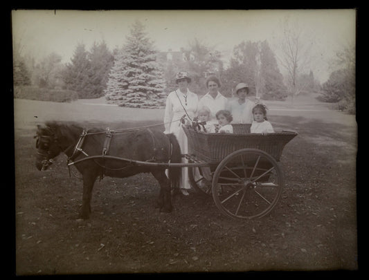 Lot 150 - Grouping Of Four Vintage Glass Plate Photographic Negatives Including Boat Scene, Luncheonette, And Two Views Of Children In Horse-Drawn Carriage