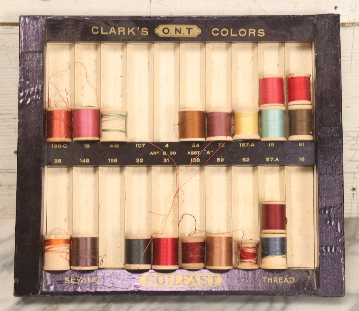 Lot 117 - Antique Clark's O.N.T. Colors Boilfast Sewing Thread Display Case With Wooden Spools, Open Top