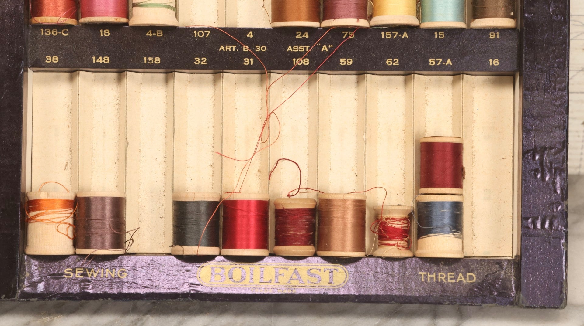 Lot 117 - Antique Clark's O.N.T. Colors Boilfast Sewing Thread Display Case With Wooden Spools, Open Top