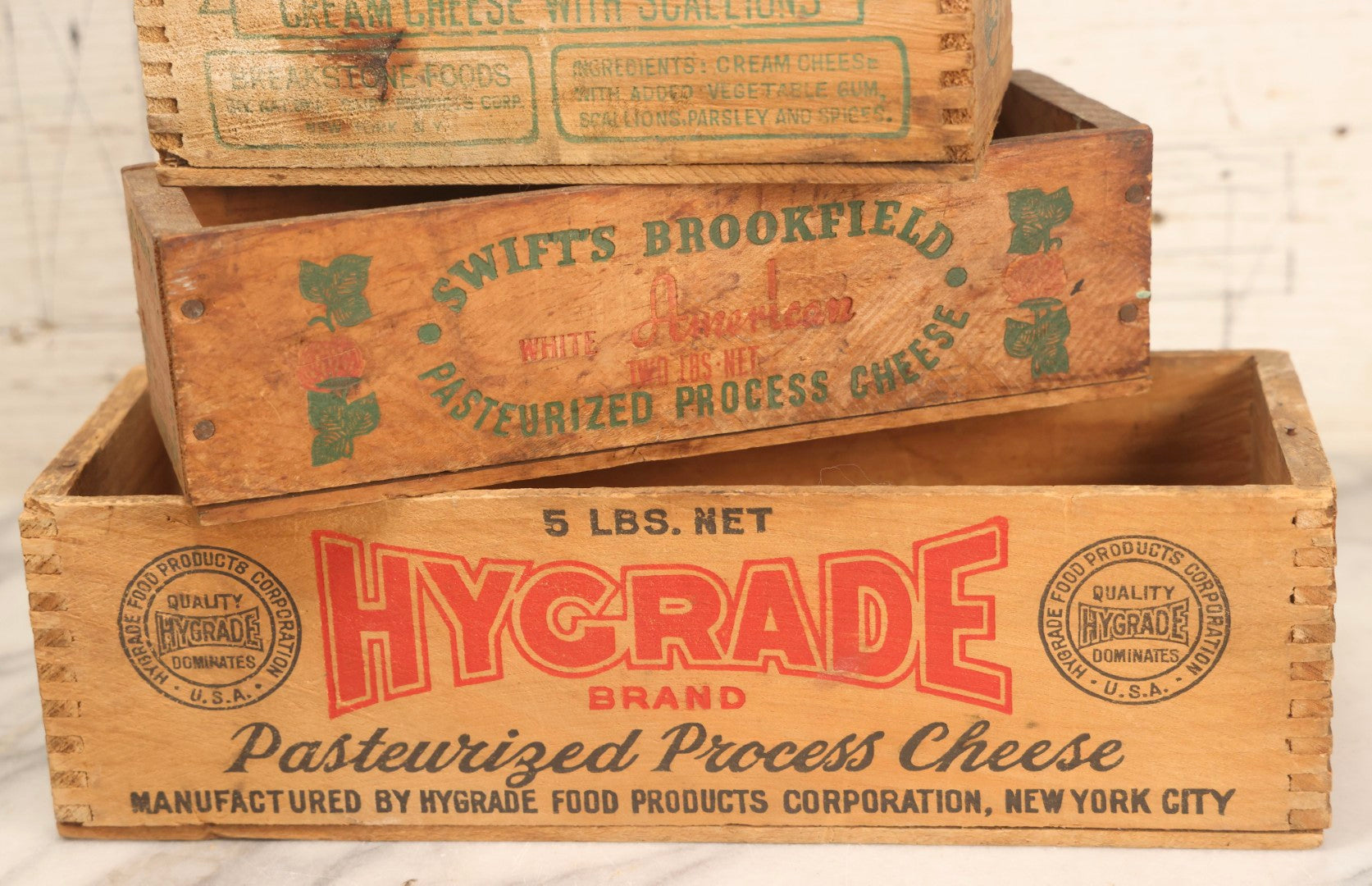 Lot 120 - Grouping Of Three Vintage Wooden Cheese Boxes Including Hygrade Brand, Swift's Brookfield White American, And Breakstone's Cream Cheese With Scallions