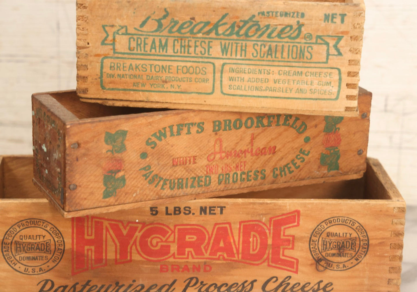 Lot 120 - Grouping Of Three Vintage Wooden Cheese Boxes Including Hygrade Brand, Swift's Brookfield White American, And Breakstone's Cream Cheese With Scallions
