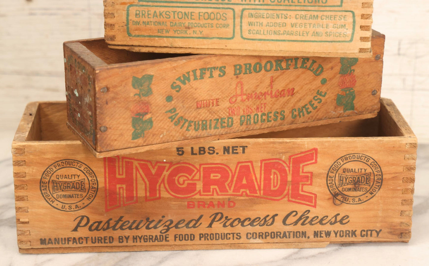 Lot 120 - Grouping Of Three Vintage Wooden Cheese Boxes Including Hygrade Brand, Swift's Brookfield White American, And Breakstone's Cream Cheese With Scallions