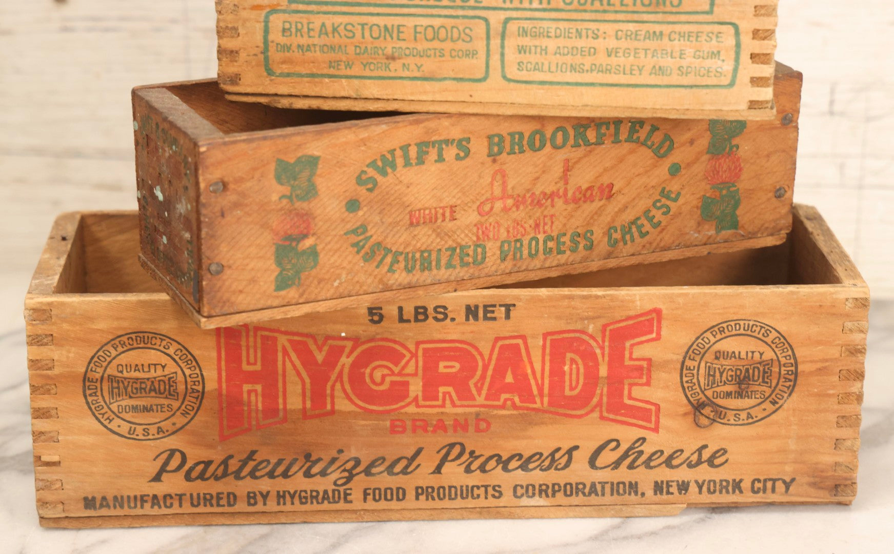 Lot 120 - Grouping Of Three Vintage Wooden Cheese Boxes Including Hygrade Brand, Swift's Brookfield White American, And Breakstone's Cream Cheese With Scallions